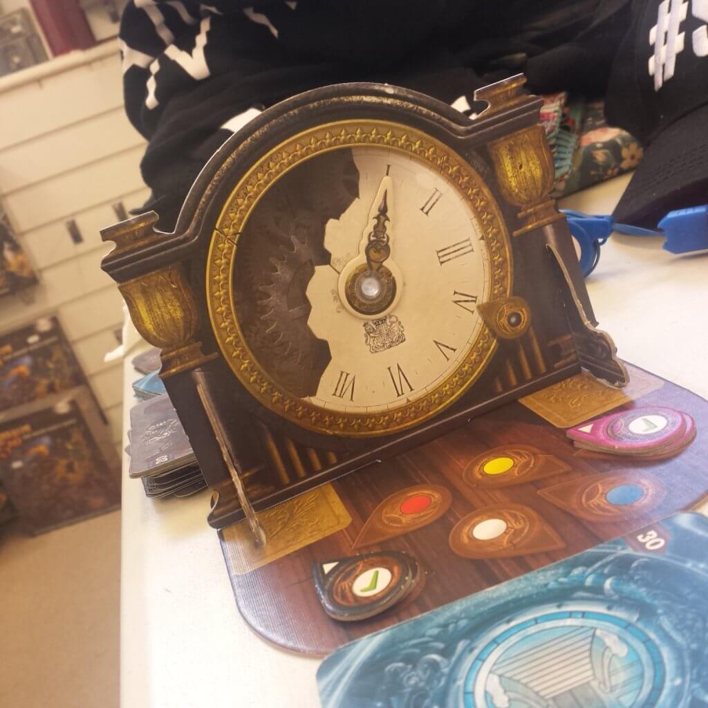 Mysterium. The clock counts down the rounds. 